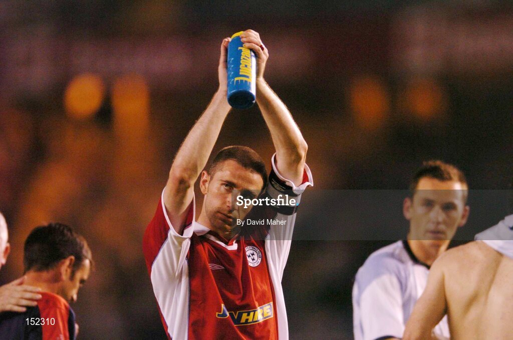 24 August 2004; A dejected Owen Heary, Shelbourne, after defeat to Deportivo La Coruna at the end of the game. UEFA Champions League, 3rd Round Second Leg Qualifier, Deportivo La Coruna v Shelbourne, Riazor stadium. La Coruna, Spain. Picture credit; David Maher / SPORTSFILE