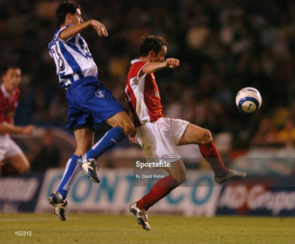 24 August 2004; Ollie Cahill , Shelbourne, in action against Victor Sandrez, Deportivo La Coruna. UEFA Champions League, 3rd Round Second Leg Qualifier, Deportivo La Coruna v Shelbourne, Riazor stadium. La Coruna, Spain. Picture credit; David Maher / SPORTSFILE