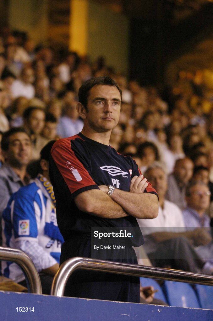 24 August 2004; Pat Fenlon, Shelbourne manager, watches from the stands after been sent off during the second half by referee Alain Hamer. UEFA Champions League, 3rd Round Second Leg Qualifier, Deportivo La Coruna v Shelbourne, Riazor stadium. La Coruna, Spain. Picture credit; David Maher / SPORTSFILE