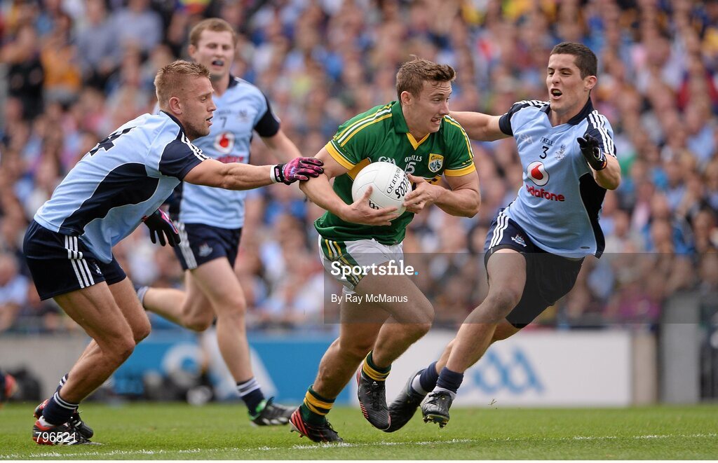 1 September 2013; James O'Donoghue, Kerry, in action against Jonny Cooper, left, and Rory O'Carroll, Dublin. GAA Football All-Ireland Senior Championship, Semi-Final, Dublin v Kerry, Croke Park, Dublin. Picture credit: Ray McManus / SPORTSFILE