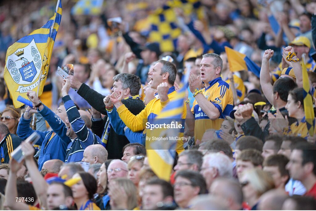 28 September 2013; Clare supporters celebrate a score. GAA Hurling All-Ireland Senior Championship Final Replay, Cork v Clare, Croke Park, Dublin. Picture credit: Stephen McCarthy / SPORTSFILE