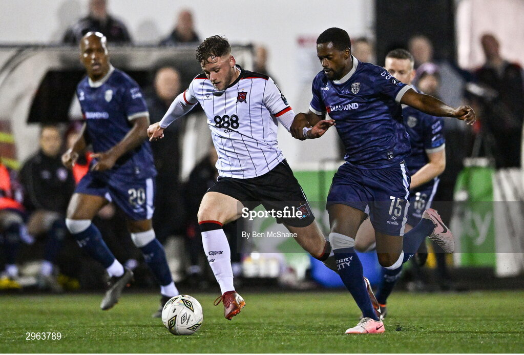 18 October 2024; Jamie Gullan of Dundalk in action against Sadou Diallo of Derry City during the SSE Airtricity Men's Premier Division match between Dundalk and Derry City at Oriel Park in Dundalk, Louth. Photo by Ben McShane/Sportsfile