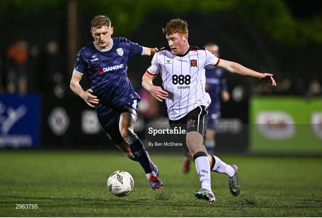 18 October 2024; Sean Keogh of Dundalk in action against Ronan Boyce of Derry City during the SSE Airtricity Men's Premier Division match between Dundalk and Derry City at Oriel Park in Dundalk, Louth. Photo by Ben McShane/Sportsfile