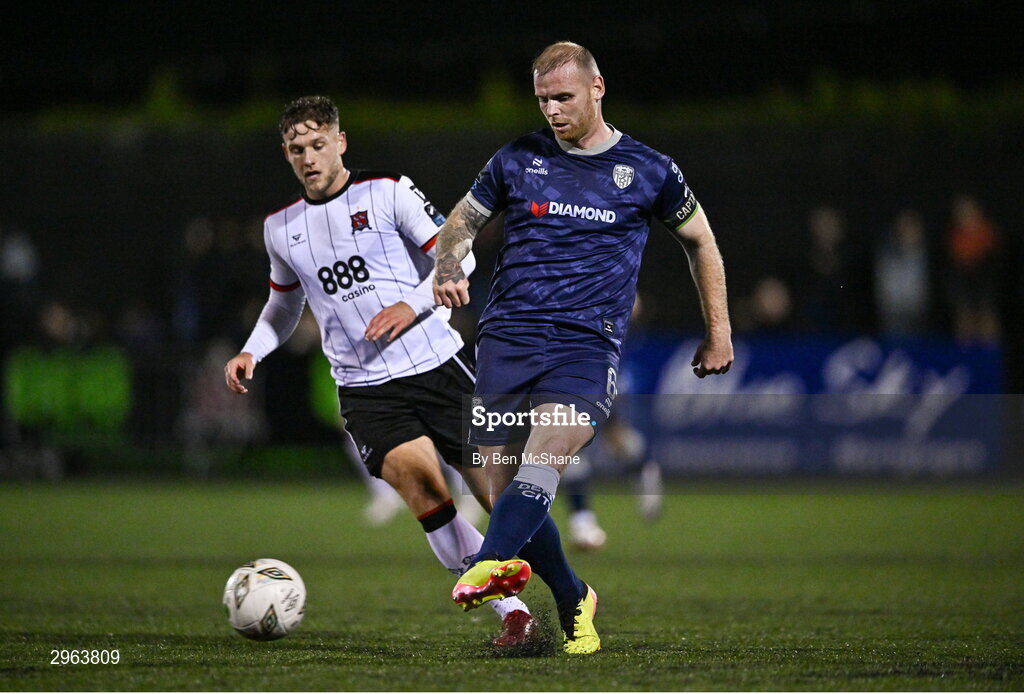 18 October 2024; Mark Connolly of Derry City in action against Jamie Gullan of Dundalk during the SSE Airtricity Men's Premier Division match between Dundalk and Derry City at Oriel Park in Dundalk, Louth. Photo by Ben McShane/Sportsfile