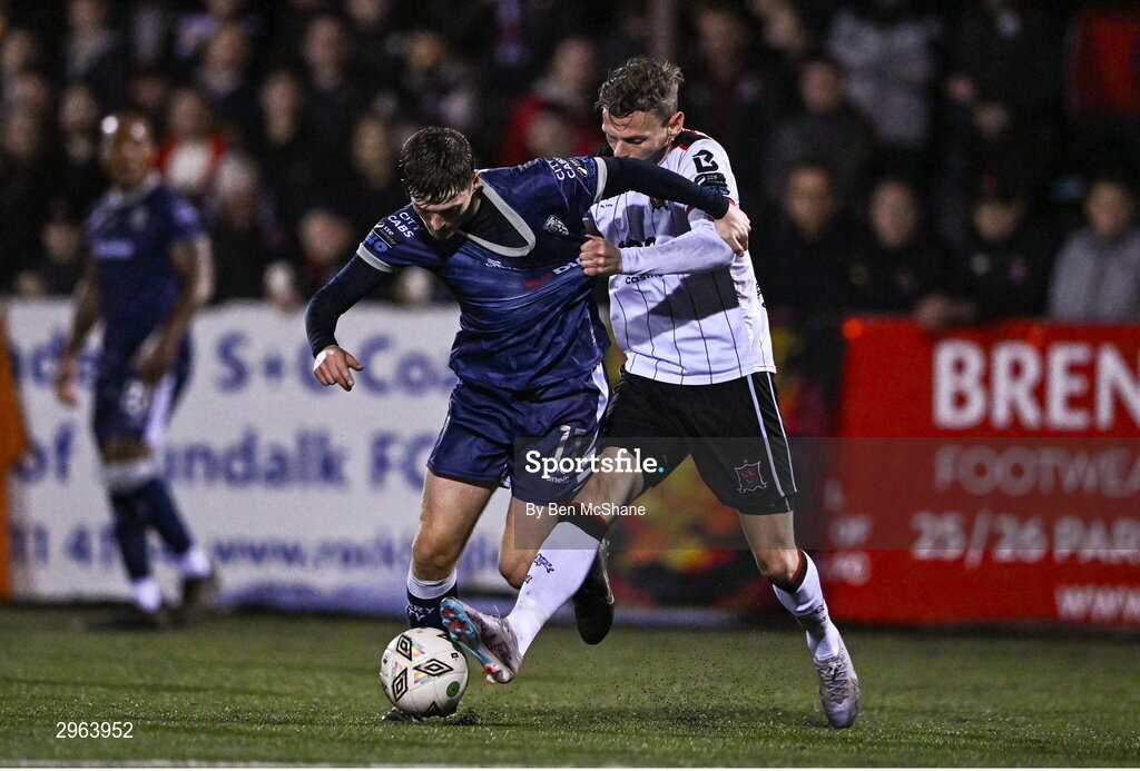 18 October 2024; Colm Whelan of Derry City in action against Andy Boyle of Dundalk during the SSE Airtricity Men's Premier Division match between Dundalk and Derry City at Oriel Park in Dundalk, Louth. Photo by Ben McShane/Sportsfile