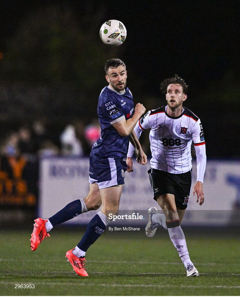 18 October 2024; Michael Duffy of Derry City in action against Koen Oostenbrink of Dundalk during the SSE Airtricity Men's Premier Division match between Dundalk and Derry City at Oriel Park in Dundalk, Louth. Photo by Ben McShane/Sportsfile