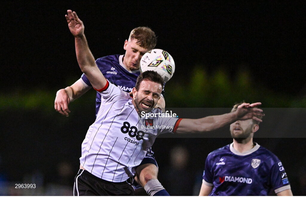18 October 2024; Ronan Boyce of Derry City in action against Robbie Benson of Dundalk during the SSE Airtricity Men's Premier Division match between Dundalk and Derry City at Oriel Park in Dundalk, Louth. Photo by Ben McShane/Sportsfile