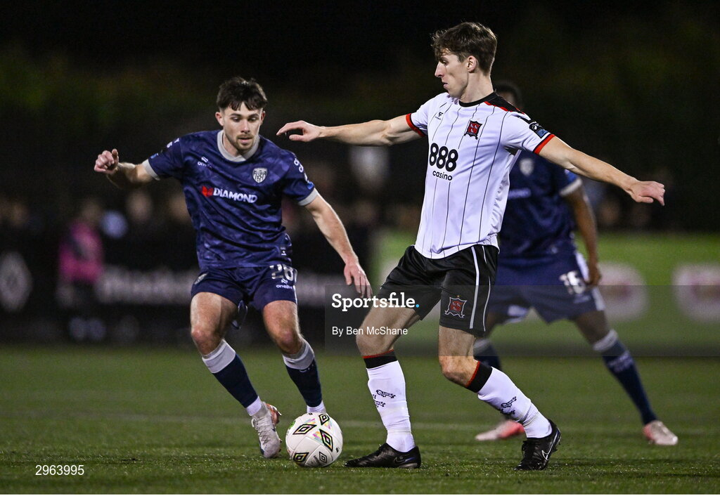 18 October 2024; Dara Keane of Dundalk in action against Adam O'Reilly of Derry City during the SSE Airtricity Men's Premier Division match between Dundalk and Derry City at Oriel Park in Dundalk, Louth. Photo by Ben McShane/Sportsfile