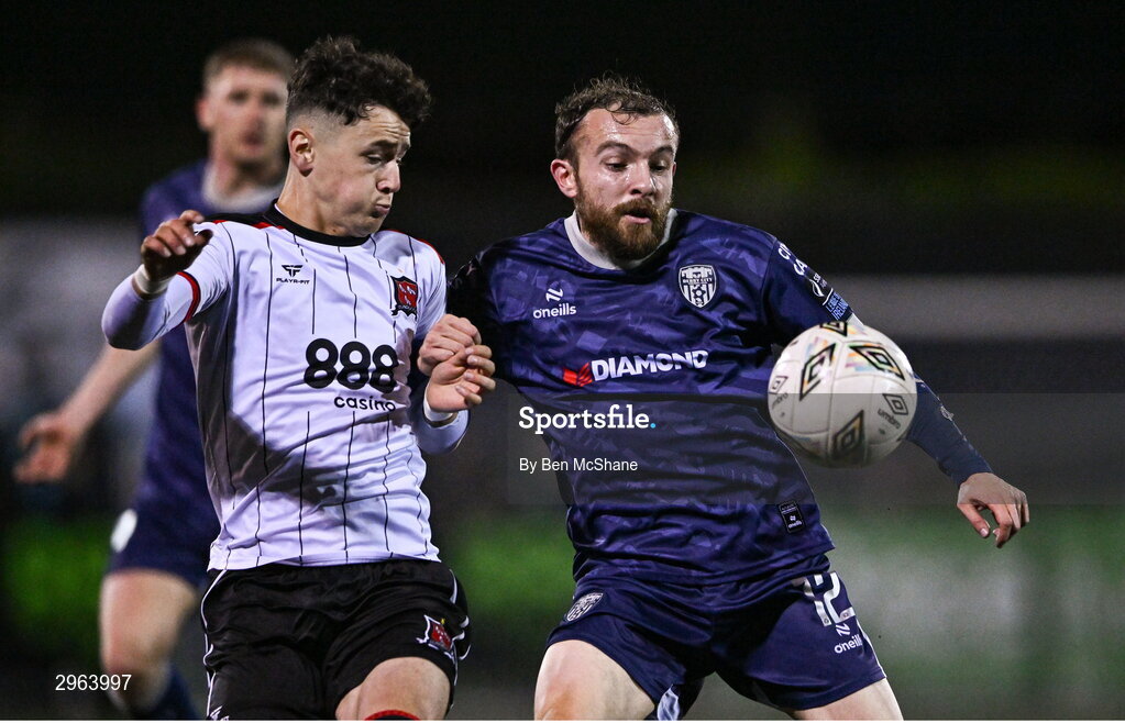 18 October 2024; Paul McMullan of Derry City in action against Ryan O'Kane of Dundalk during the SSE Airtricity Men's Premier Division match between Dundalk and Derry City at Oriel Park in Dundalk, Louth. Photo by Ben McShane/Sportsfile