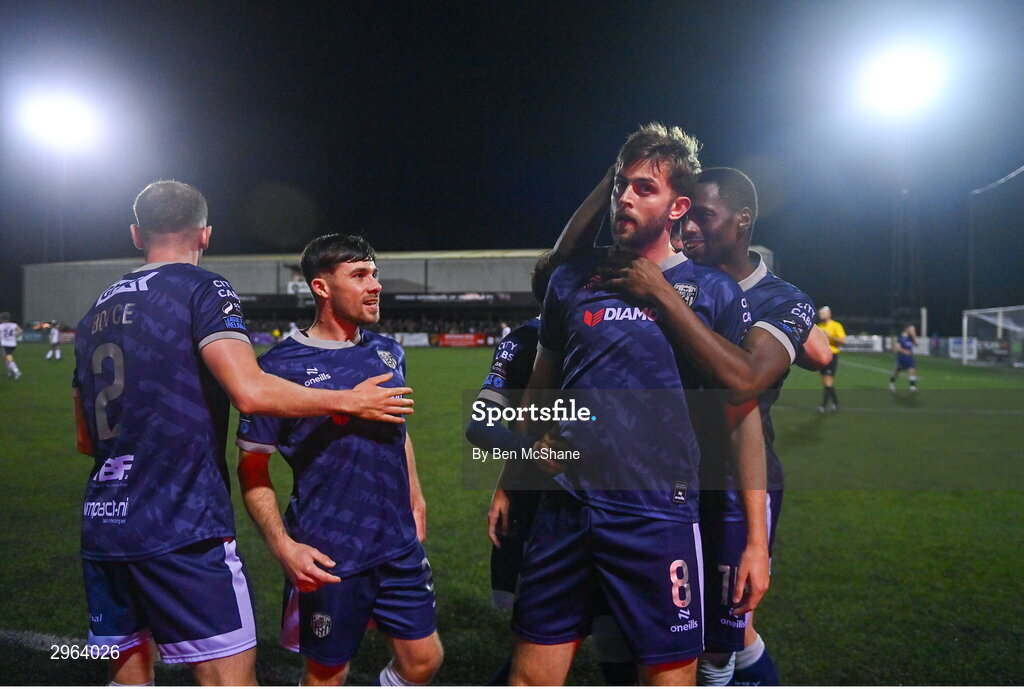 18 October 2024; Will Patching of Derry City celebrates with teammates, including Sadou Diallo, right, after scoring their side's second goal during the SSE Airtricity Men's Premier Division match between Dundalk and Derry City at Oriel Park in Dundalk, Louth. Photo by Ben McShane/Sportsfile