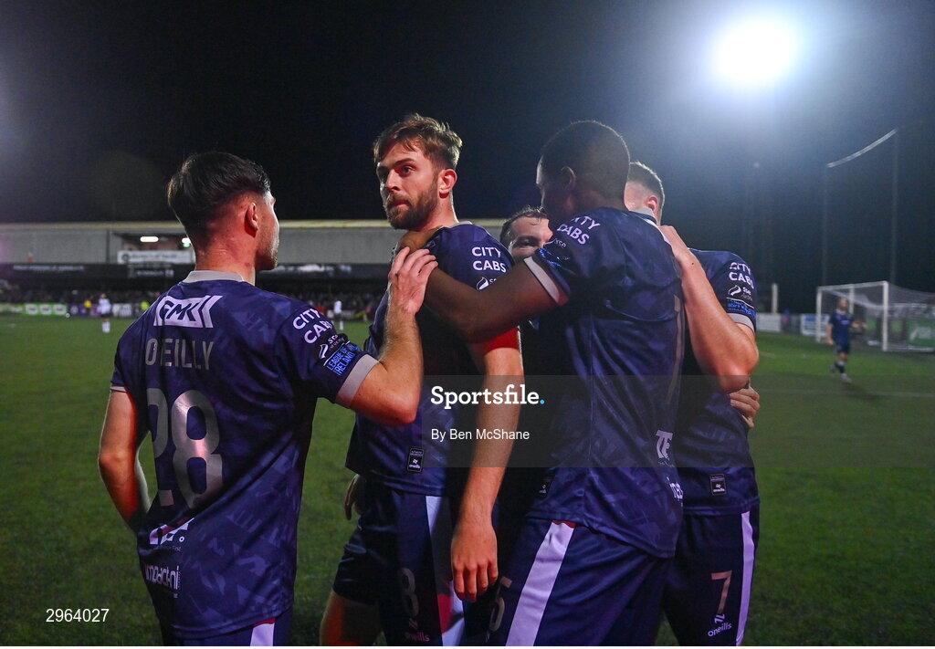18 October 2024; Will Patching of Derry City celebrates with teammates, including Sadou Diallo, right, and Adam O'Reilly, left, after scoring their side's second goal during the SSE Airtricity Men's Premier Division match between Dundalk and Derry City at Oriel Park in Dundalk, Louth. Photo by Ben McShane/Sportsfile