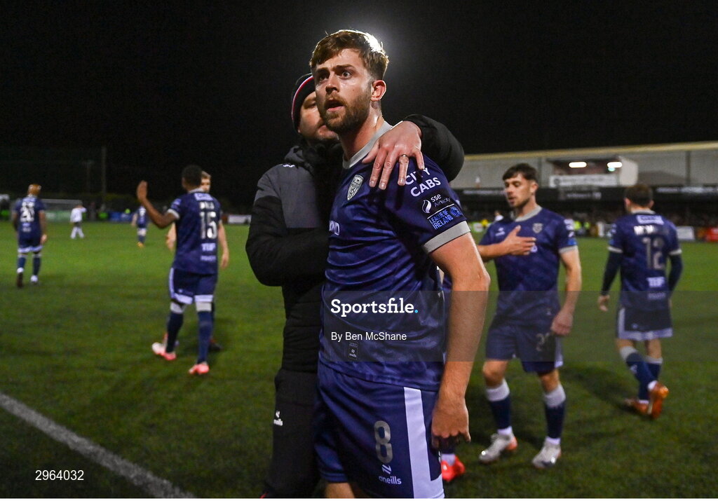 18 October 2024; Will Patching of Derry City celebrates with Derry City manager Ruaidhrí Higgins, left, after scoring their side's second goal during the SSE Airtricity Men's Premier Division match between Dundalk and Derry City at Oriel Park in Dundalk, Louth. Photo by Ben McShane/Sportsfile