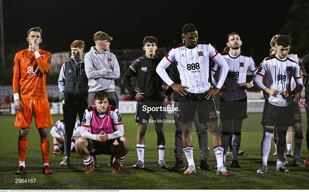 18 October 2024; Dundalk players and staff react as their side is relegated after the SSE Airtricity Men's Premier Division match between Dundalk and Derry City at Oriel Park in Dundalk, Louth. Photo by Ben McShane/Sportsfile