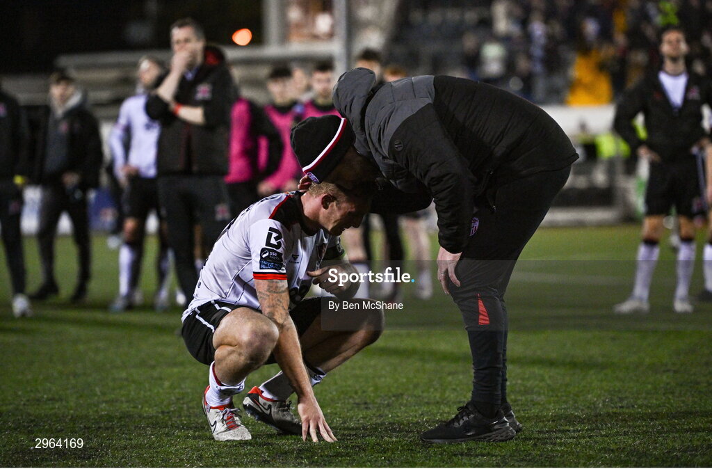 18 October 2024; Derry City manager Ruaidhrí Higgins consoles an emotional Dundalk captain John Mountney after the SSE Airtricity Men's Premier Division match between Dundalk and Derry City at Oriel Park in Dundalk, Louth. Photo by Ben McShane/Sportsfile