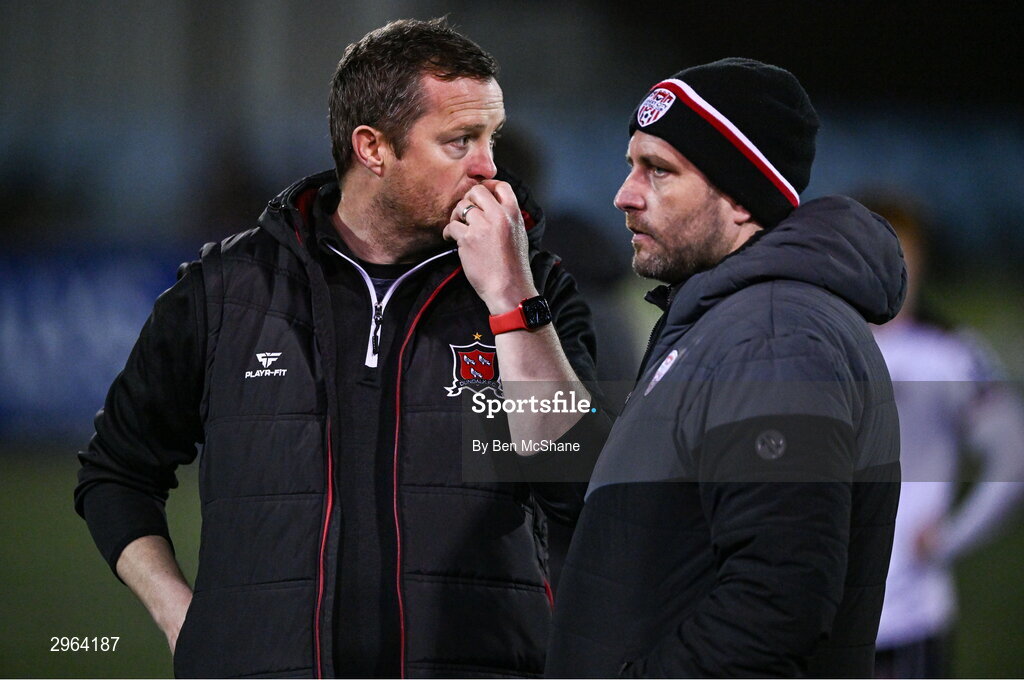 18 October 2024; Dundalk manager Jon Daly in conversation with Derry City manager Ruaidhrí Higgins after the SSE Airtricity Men's Premier Division match between Dundalk and Derry City at Oriel Park in Dundalk, Louth. Photo by Ben McShane/Sportsfile