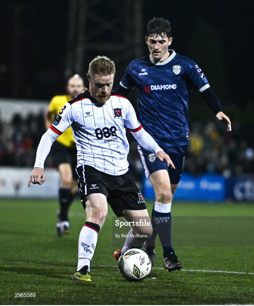 18 October 2024; Daryl Horgan of Dundalk and Colm Whelan of Derry City during the SSE Airtricity Men's Premier Division match between Dundalk and Derry City at Oriel Park in Dundalk, Louth. Photo by Ben McShane/Sportsfile