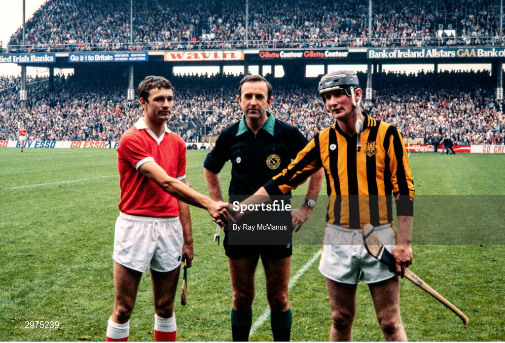 5 September 1982; Team captains Jimmy Barry Murphy of Cork, left, and Brian Cody of Kilkenny shake hands in the company of referee Noel O'Donoghue before the All-Ireland Senior Hurling Championship Final match between Cork and Kilkenny at Croke Park in Dublin. Photo by Ray McManus/Sportsfile