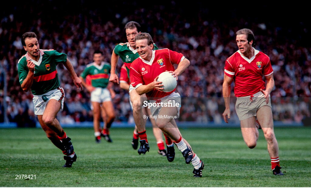 17 September 1989; John Cleary of Cork, supported by teammate Larry Tompkins, right, in action TJ Kilgallon of Mayo during the All-Ireland Senior Football Championship Final between Cork and Mayo at Croke Park in Dublin. Photo Ray McManus/Sportsfile