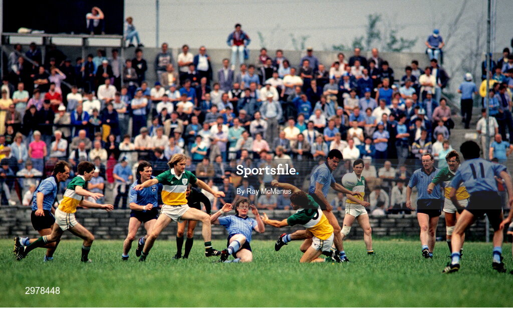 29 June 1986; Jim Ronayne of Dublin and Padraig Dunne of Offaly in action during the Leinster Senior Football Championship Semi-final match between Dublin and Offaly in O'Moore Park in Portlaoise, Laois. Photo by Ray McManus/Sportsfile