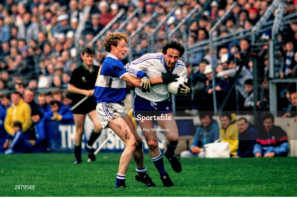 4 May 1986; Eugene Sherry of Monaghan is tackled by Liam Irwin of Laois during the Ford National Football League Division 1 Final match between Laois and Monaghan at Croke Park, Dublin. Photo by Ray McManus/Sportsfile