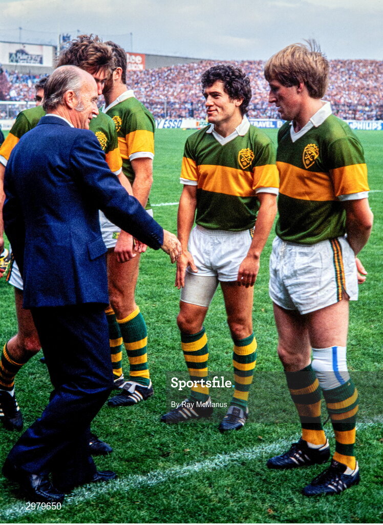 23 September 1984; President of Ireland Dr Patrick Hillery is introduced to Kerry players Ger Power and Pat Spillane by team captain Ambrose O'Donovan before the All-Ireland Senior Football Championship final between Kerry and Dublin at Croke Park in Dublin. Photo by Ray McManus/Sportsfile