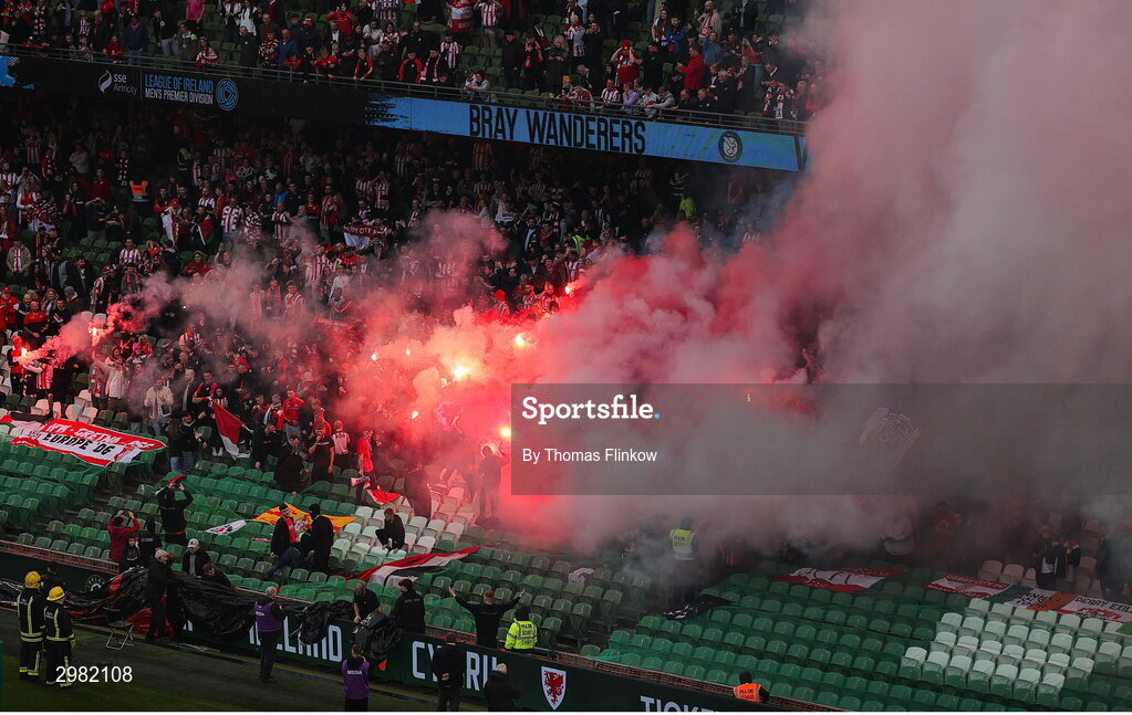 10 November 2024; Supporters light flares before the Sports Direct Men's FAI Cup Final match between Drogheda United and Derry City at the Aviva Stadium in Dublin. Photo by Thomas Flinkow/Sportsfile
