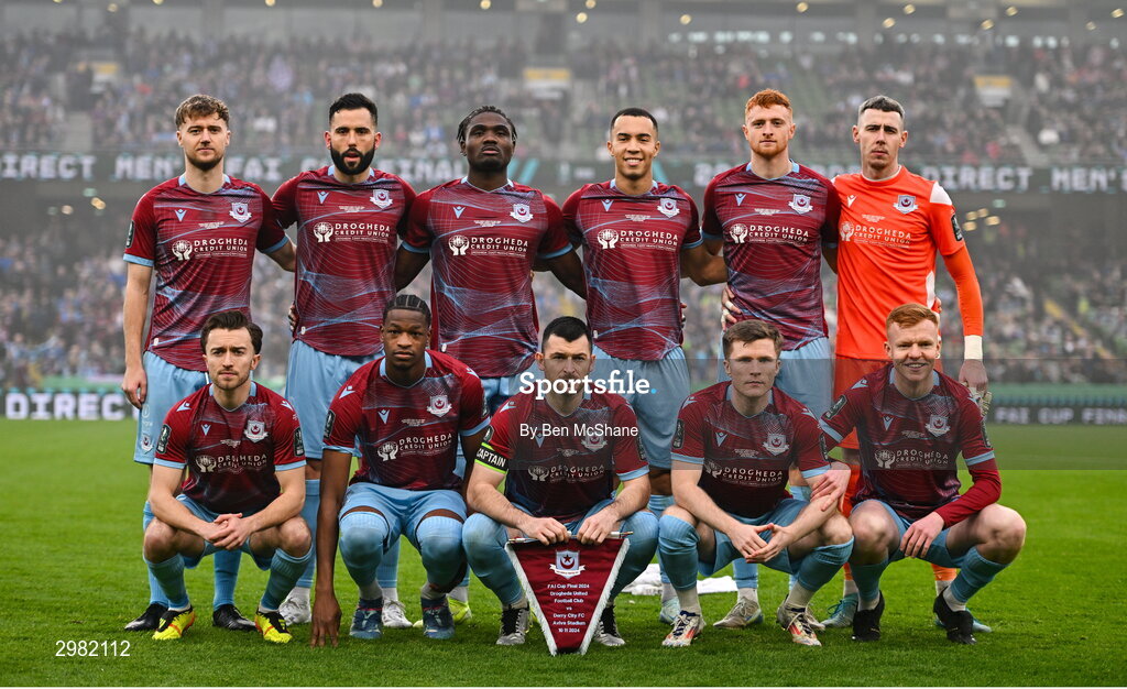 10 November 2024; The Drogheda United team, back row, from left, Andrew Quinn, Dave Webster, Frantz Pierrot, Douglas James-Taylor, James Bolger and goalkeeper Luke Dennison, with, from left, Darragh Markey, Elicha Ahui, Ryan Brennan, Conor Kane and Shane Farrell before the Sports Direct Men's FAI Cup Final match between Drogheda United and Derry City at the Aviva Stadium in Dublin. Photo by Ben McShane/Sportsfile