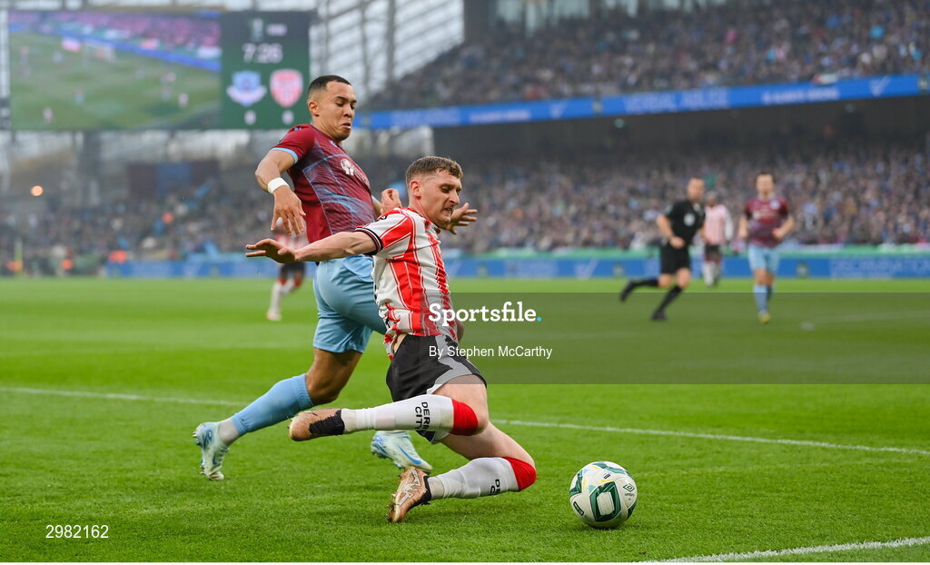 10 November 2024; Ronan Boyce of Derry City in action against Douglas James-Taylor of Drogheda United during the Sports Direct Men's FAI Cup Final match between Drogheda United and Derry City at the Aviva Stadium in Dublin. Photo by Stephen McCarthy/Sportsfile