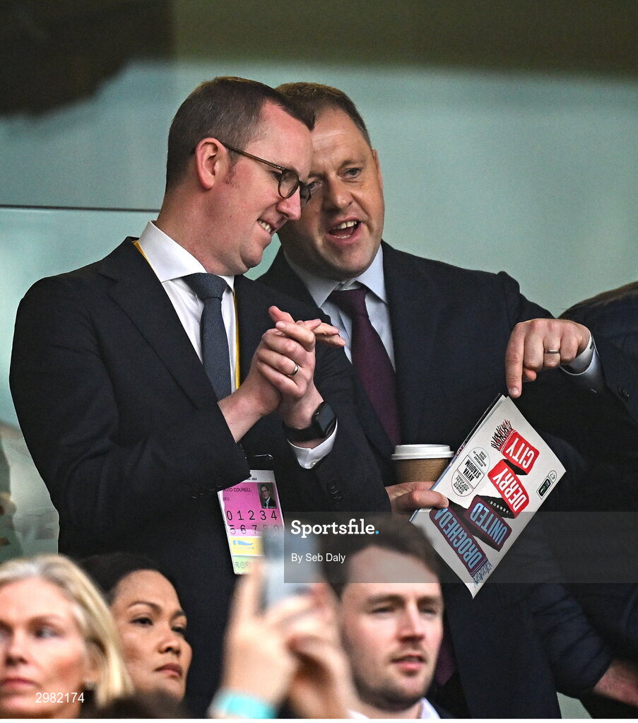 10 November 2024; FAI chief executive officer David Courell, left, with Fianna Fáil politician and former Minister of State at the Department of Tourism, Culture, Arts, Gaeltacht, Sport and Media and Equality, Thomas Byrne, during the Sports Direct Men's FAI Cup Final match between Drogheda United and Derry City at the Aviva Stadium in Dublin. Photo by Seb Daly/Sportsfile