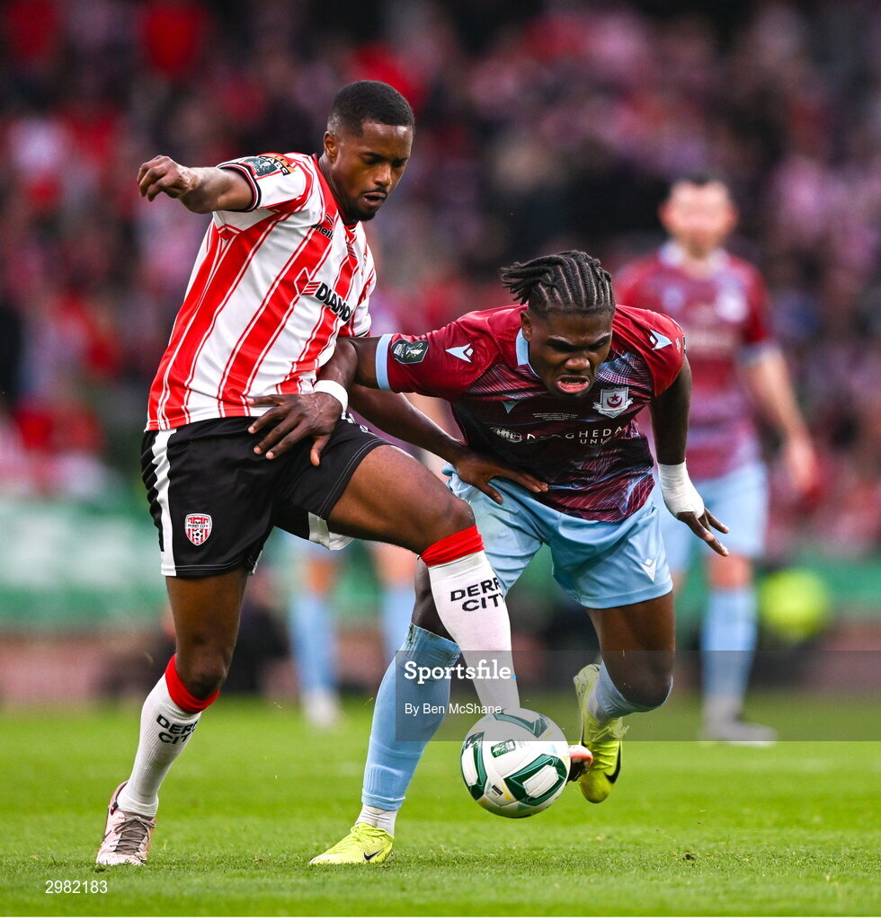 10 November 2024; Sadou Diallo of Derry City is tackled by Frantz Pierrot of Drogheda United during the Sports Direct Men's FAI Cup Final match between Drogheda United and Derry City at the Aviva Stadium in Dublin. Photo by Ben McShane/Sportsfile