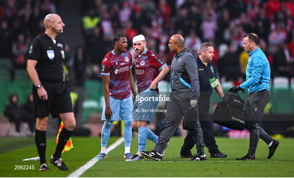 10 November 2024; Ryan Brennan of Drogheda United leaves the pitch after sustaining an injury during the Sports Direct Men's FAI Cup Final match between Drogheda United and Derry City at the Aviva Stadium in Dublin. Photo by Ben McShane/Sportsfile