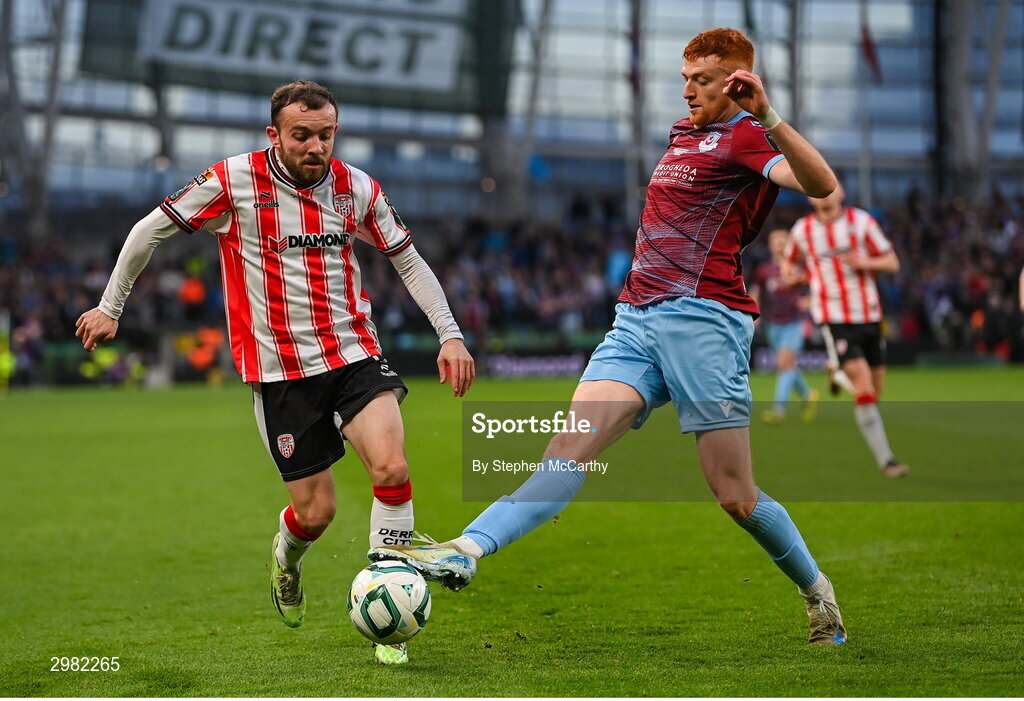 10 November 2024; Paul McMullan of Derry City in action against James Bolger of Drogheda United during the Sports Direct Men's FAI Cup Final match between Drogheda United and Derry City at the Aviva Stadium in Dublin. Photo by Stephen McCarthy/Sportsfile
