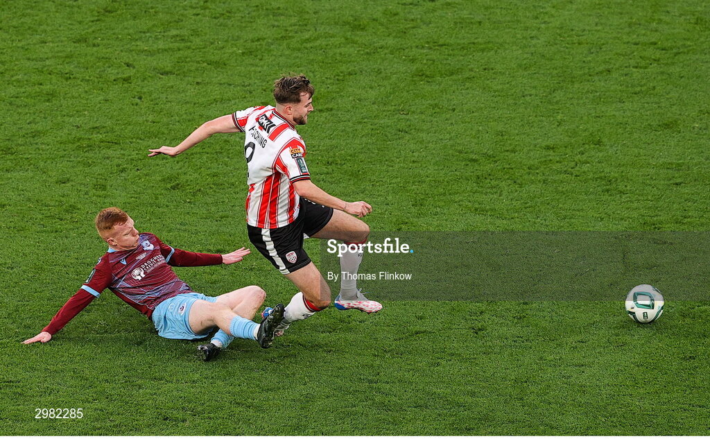 10 November 2024; Will Patching of Derry City is tackled by Shane Farrell of Drogheda United during the Sports Direct Men's FAI Cup Final match between Drogheda United and Derry City at the Aviva Stadium in Dublin. Photo by Thomas Flinkow/Sportsfile