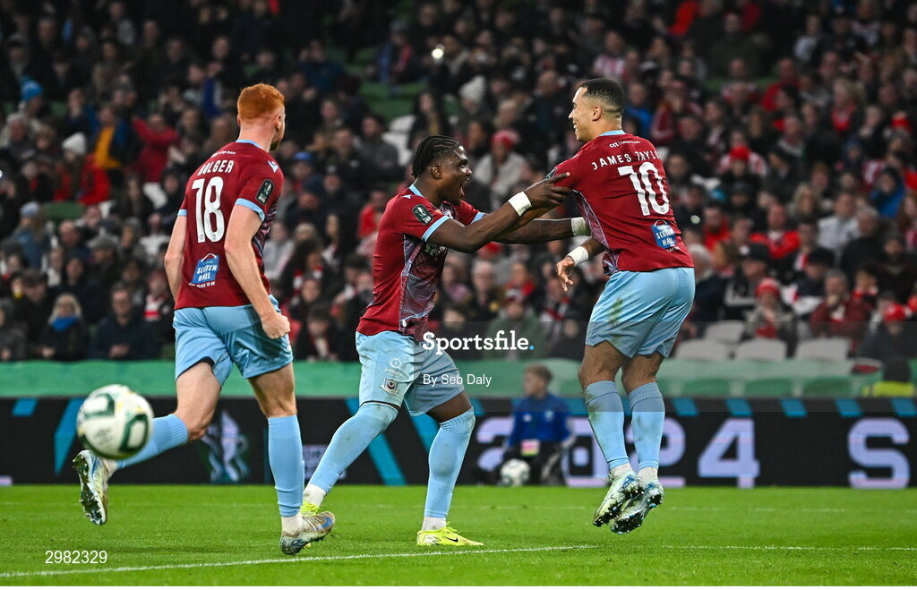 10 November 2024; Douglas James-Taylor of Drogheda United celebrates with teammate Frantz Pierrot, left, and scoring their side's second goal during the Sports Direct Men's FAI Cup Final match between Drogheda United and Derry City at the Aviva Stadium in Dublin. Photo by Seb Daly/Sportsfile