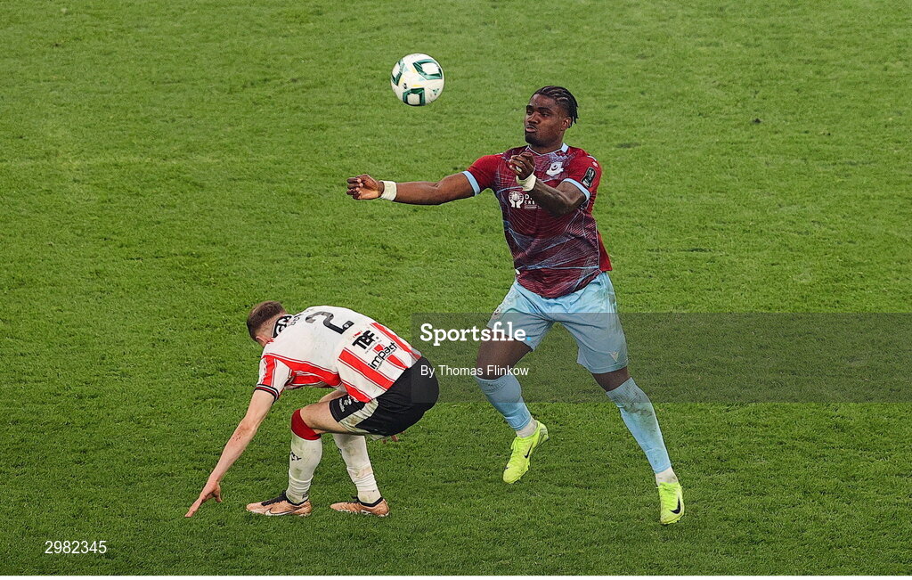 10 November 2024; Frantz Pierrot of Drogheda United in action against Ronan Boyce of Derry City during the Sports Direct Men's FAI Cup Final match between Drogheda United and Derry City at the Aviva Stadium in Dublin. Photo by Thomas Flinkow/Sportsfile