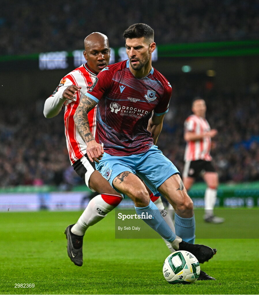 10 November 2024; Adam Foley of Drogheda United in action against Andre Wisdom of Derry City during the Sports Direct Men's FAI Cup Final match between Drogheda United and Derry City at the Aviva Stadium in Dublin. Photo by Seb Daly/Sportsfile
