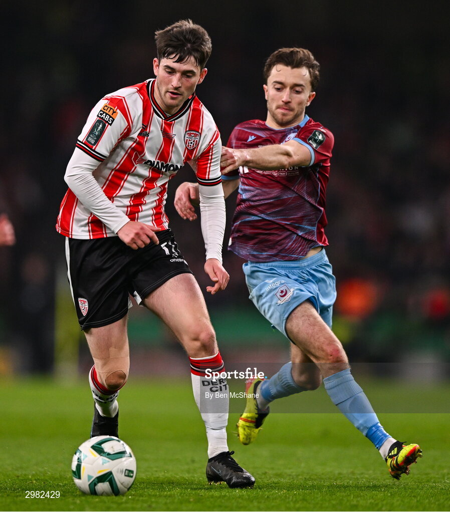 10 November 2024; Colm Whelan of Derry City in action against Darragh Markey of Drogheda United during the Sports Direct Men's FAI Cup Final match between Drogheda United and Derry City at the Aviva Stadium in Dublin. Photo by Ben McShane/Sportsfile