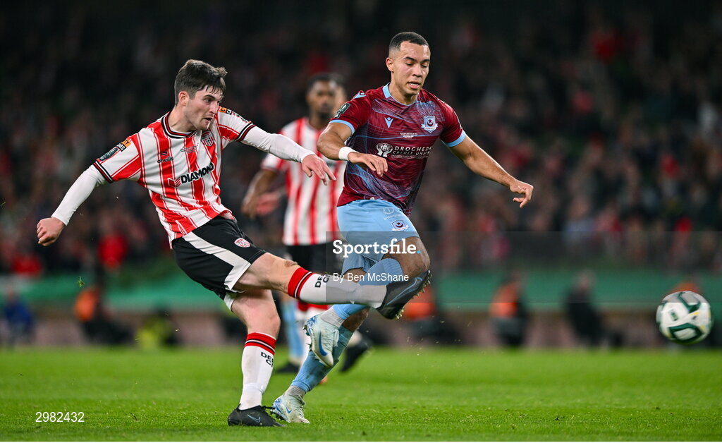 10 November 2024; Colm Whelan of Derry City in action against Douglas James-Taylor of Drogheda United during the Sports Direct Men's FAI Cup Final match between Drogheda United and Derry City at the Aviva Stadium in Dublin. Photo by Ben McShane/Sportsfile