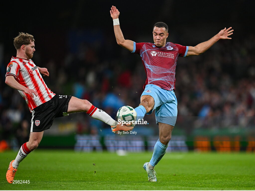 10 November 2024; Douglas James-Taylor of Drogheda United in action against Jacob Davenport of Derry City during the Sports Direct Men's FAI Cup Final match between Drogheda United and Derry City at the Aviva Stadium in Dublin. Photo by Seb Daly/Sportsfile
