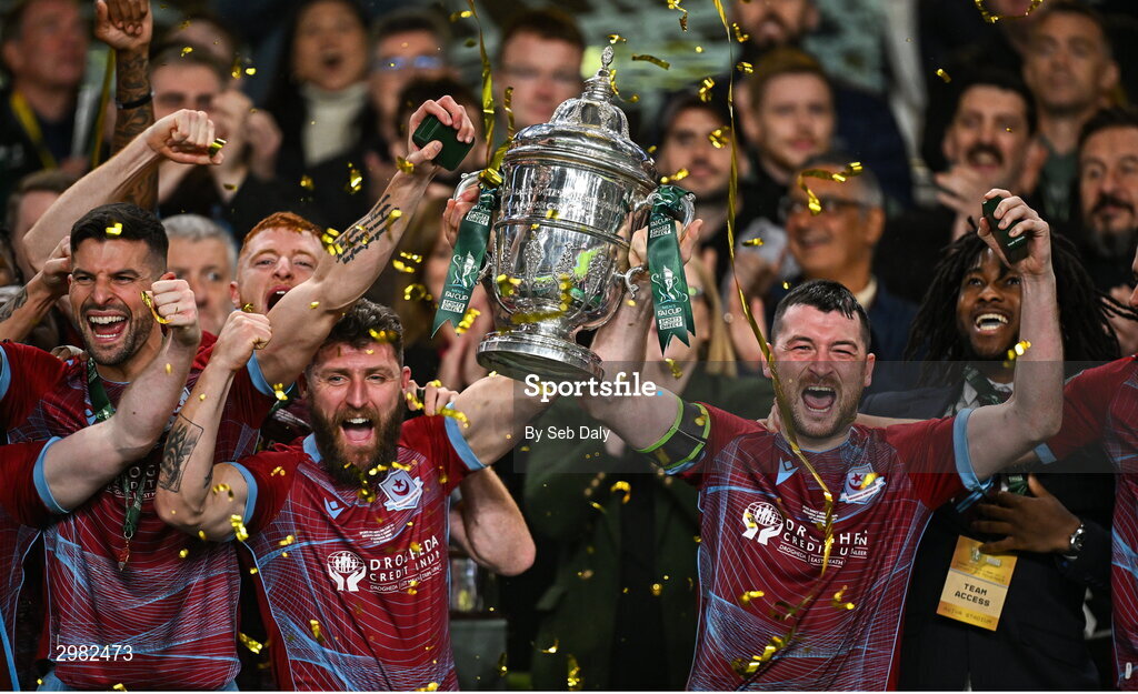 10 November 2024; Drogheda United captain Gary Deegan, left, and teammate Ryan Brennan lift the FAI Cup after the Sports Direct Men's FAI Cup Final match between Drogheda United and Derry City at the Aviva Stadium in Dublin.  Photo by Seb Daly/Sportsfile