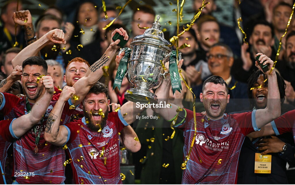 10 November 2024; Drogheda United captain Gary Deegan, left, and teammate Ryan Brennan lift the FAI Cup after the Sports Direct Men's FAI Cup Final match between Drogheda United and Derry City at the Aviva Stadium in Dublin.  Photo by Seb Daly/Sportsfile