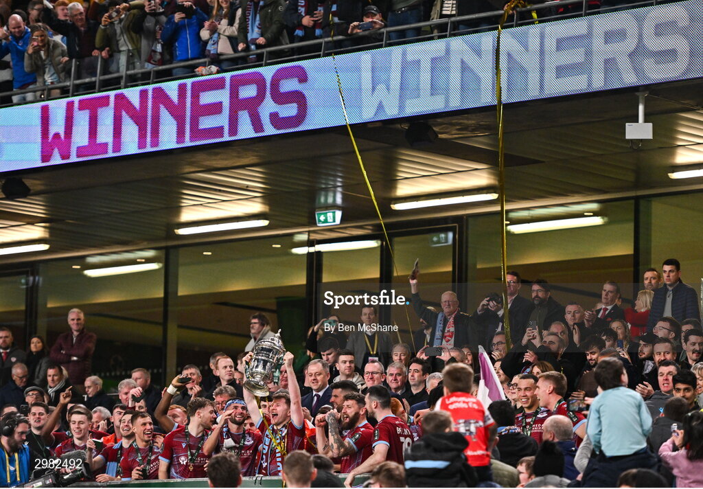 10 November 2024; Conor Kane of Drogheda United celebrates with the FAI cup after the Sports Direct Men's FAI Cup Final match between Drogheda United and Derry City at the Aviva Stadium in Dublin. Photo by Ben McShane/Sportsfile