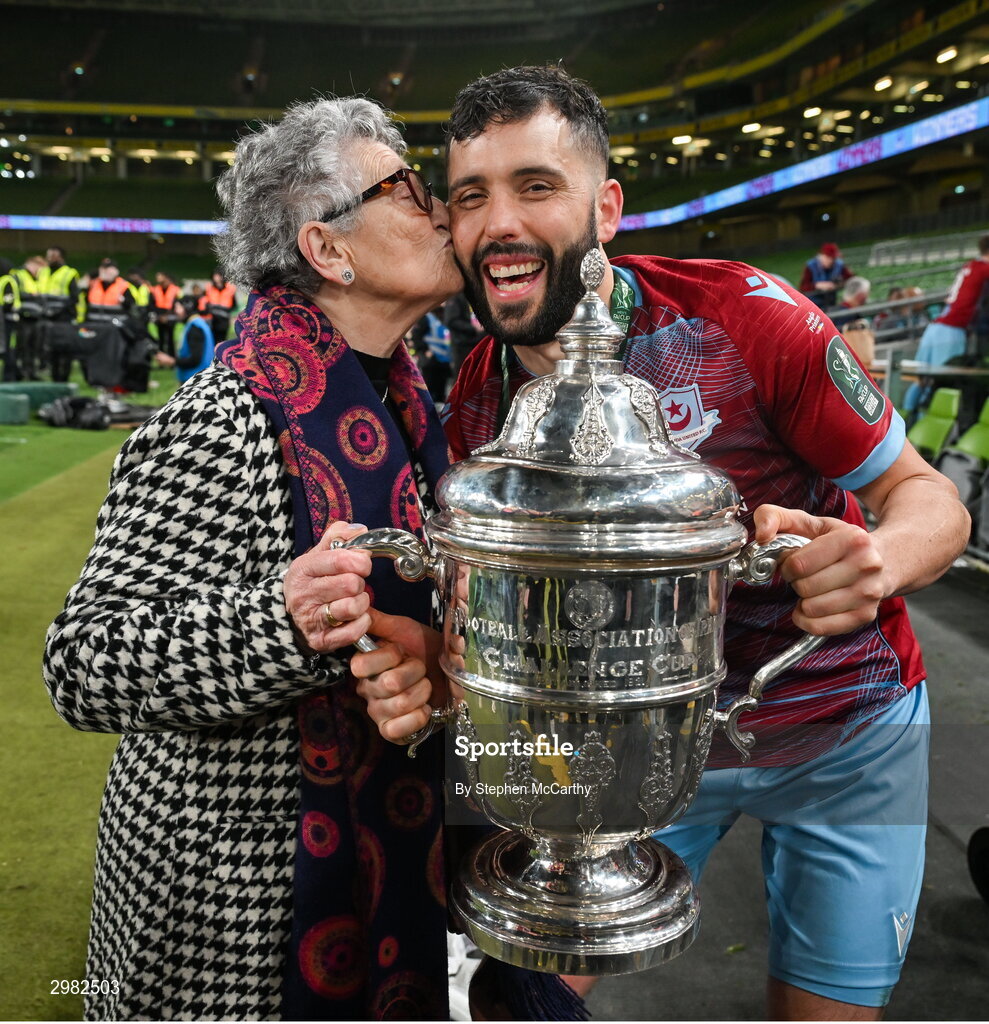 10 November 2024; Dave Webster of Drogheda United and his grandmother Rita celebrates with the cup after during the Sports Direct Men's FAI Cup Final match between Drogheda United and Derry City at the Aviva Stadium in Dublin. Photo by Stephen McCarthy/Sportsfile