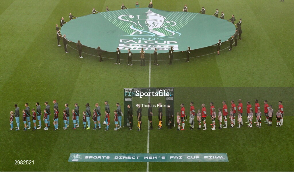 10 November 2024; Players and officials stand for Amhrán na bhFiann before the Sports Direct Men's FAI Cup Final match between Drogheda United and Derry City at the Aviva Stadium in Dublin. Photo by Thomas Flinkow/Sportsfile