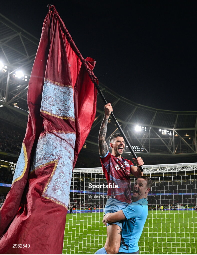 10 November 2024; Adam Foley of Drogheda United is lifted by assistant manager Daire Doyle as they celebrate after the Sports Direct Men's FAI Cup Final match between Drogheda United and Derry City at the Aviva Stadium in Dublin. Photo by Ben McShane/Sportsfile