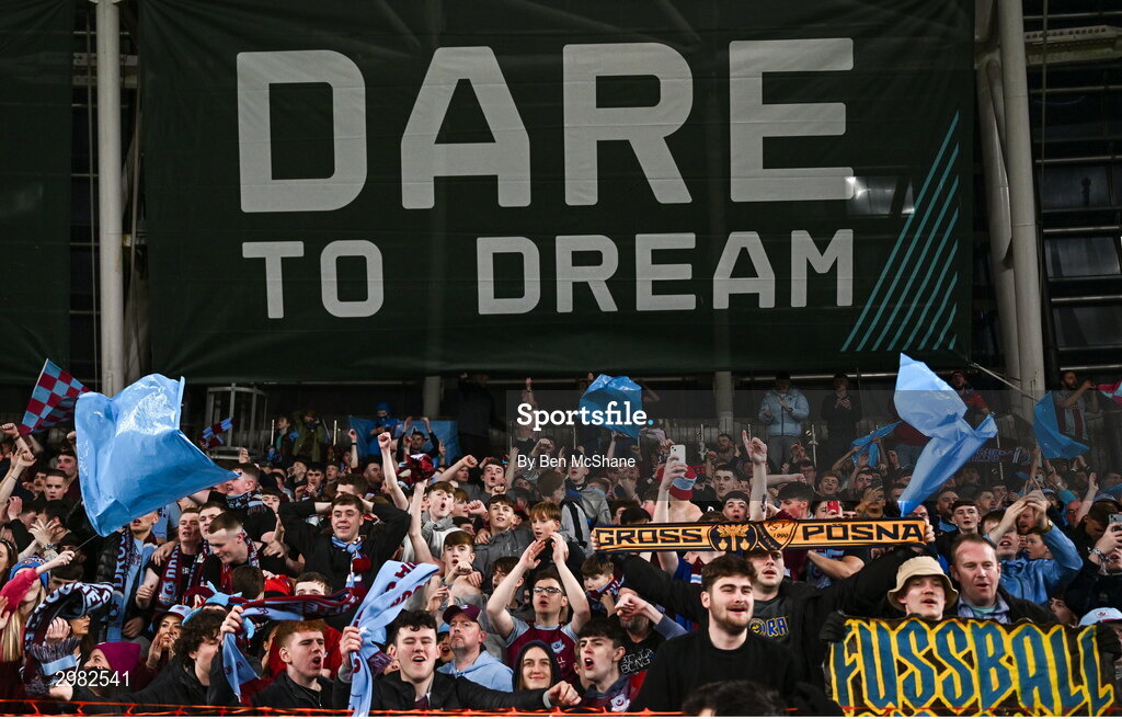 10 November 2024; Drogheda United supporters celebrate after the Sports Direct Men's FAI Cup Final match between Drogheda United and Derry City at the Aviva Stadium in Dublin. Photo by Ben McShane/Sportsfile
