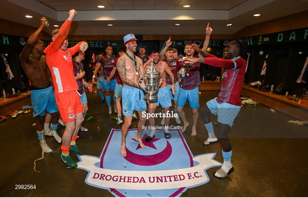 10 November 2024; Adam Foley of Drogheda United and teammates celebrate with the FAI cup in the dressingroom after the Sports Direct Men's FAI Cup Final match between Drogheda United and Derry City at the Aviva Stadium in Dublin. Photo by Stephen McCarthy/Sportsfile