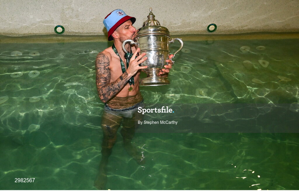 10 November 2024; Adam Foley of Drogheda United celebrates with the FAI cup in the dressingroom after the Sports Direct Men's FAI Cup Final match between Drogheda United and Derry City at the Aviva Stadium in Dublin. Photo by Stephen McCarthy/Sportsfile