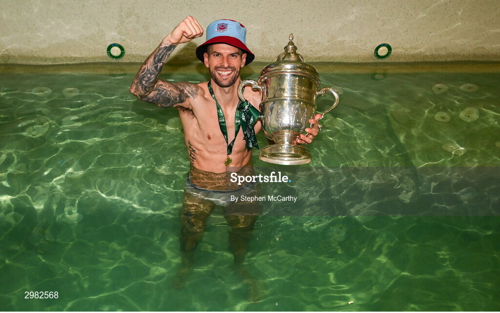 10 November 2024; Adam Foley of Drogheda United celebrates with the FAI cup in the dressingroom after the Sports Direct Men's FAI Cup Final match between Drogheda United and Derry City at the Aviva Stadium in Dublin. Photo by Stephen McCarthy/Sportsfile