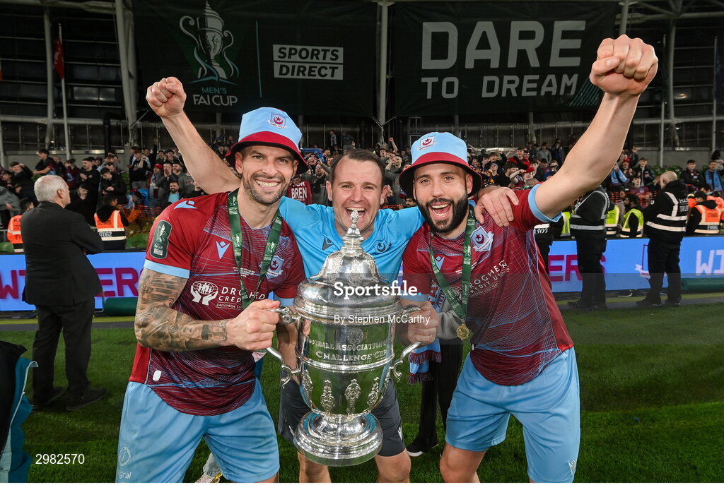10 November 2024; Drogheda United assistant manager Daire Doyle, centre, celebrates with Adam Foley, left, and Dave Webster and the FAI cup after the Sports Direct Men's FAI Cup Final match between Drogheda United and Derry City at the Aviva Stadium in Dublin. Photo by Stephen McCarthy/Sportsfile